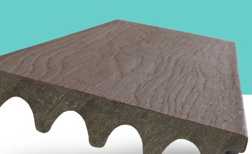 Capped composite board with a scalloped underside
