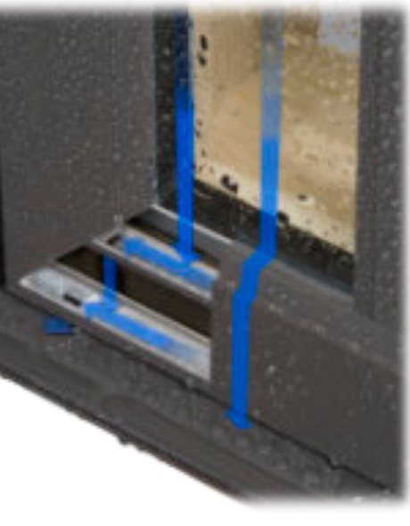 Cutaway of a window sash bottom rail showing the drainage path water takes out of the glazing channel