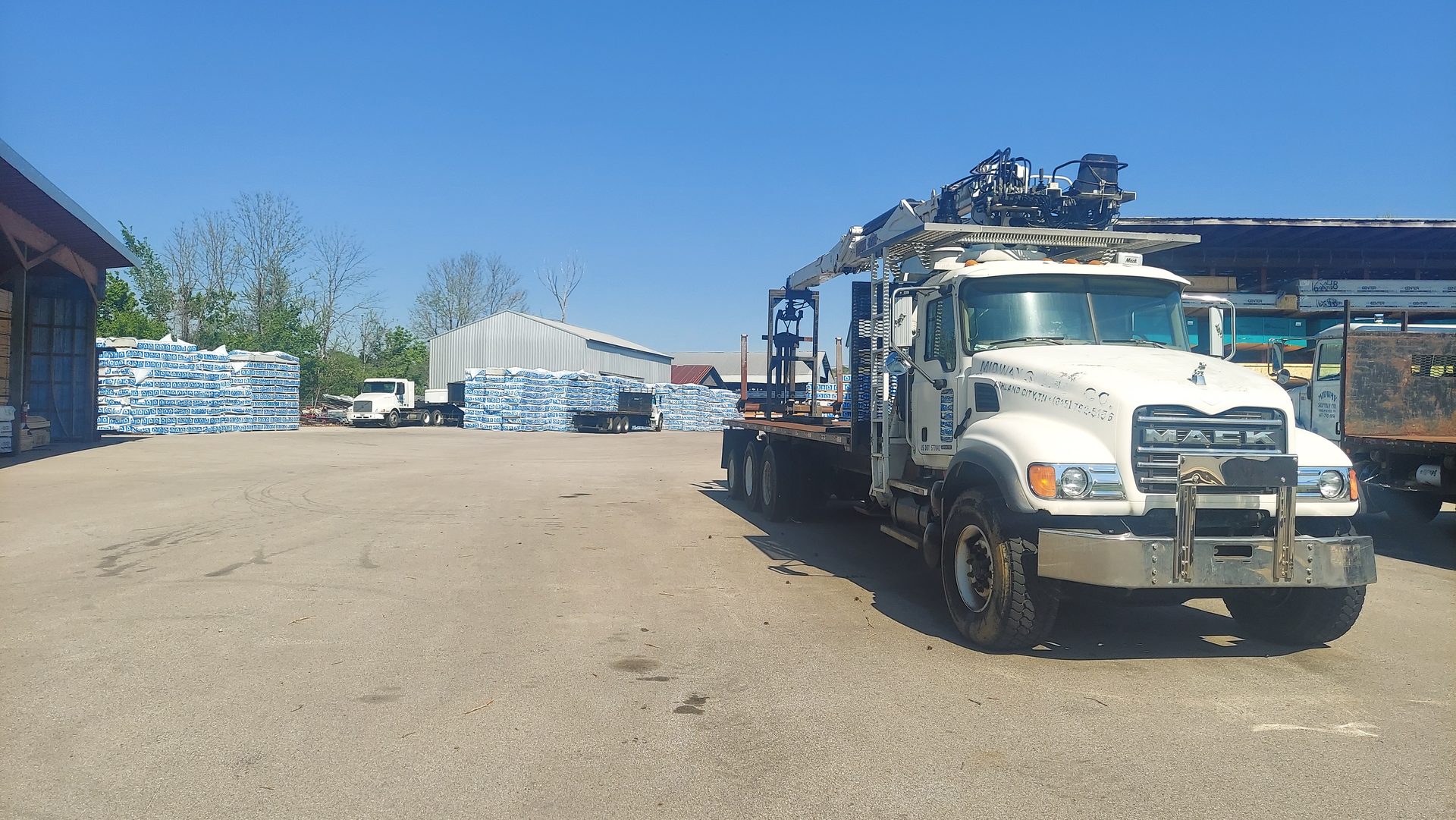 Flatbed parked in the yard
